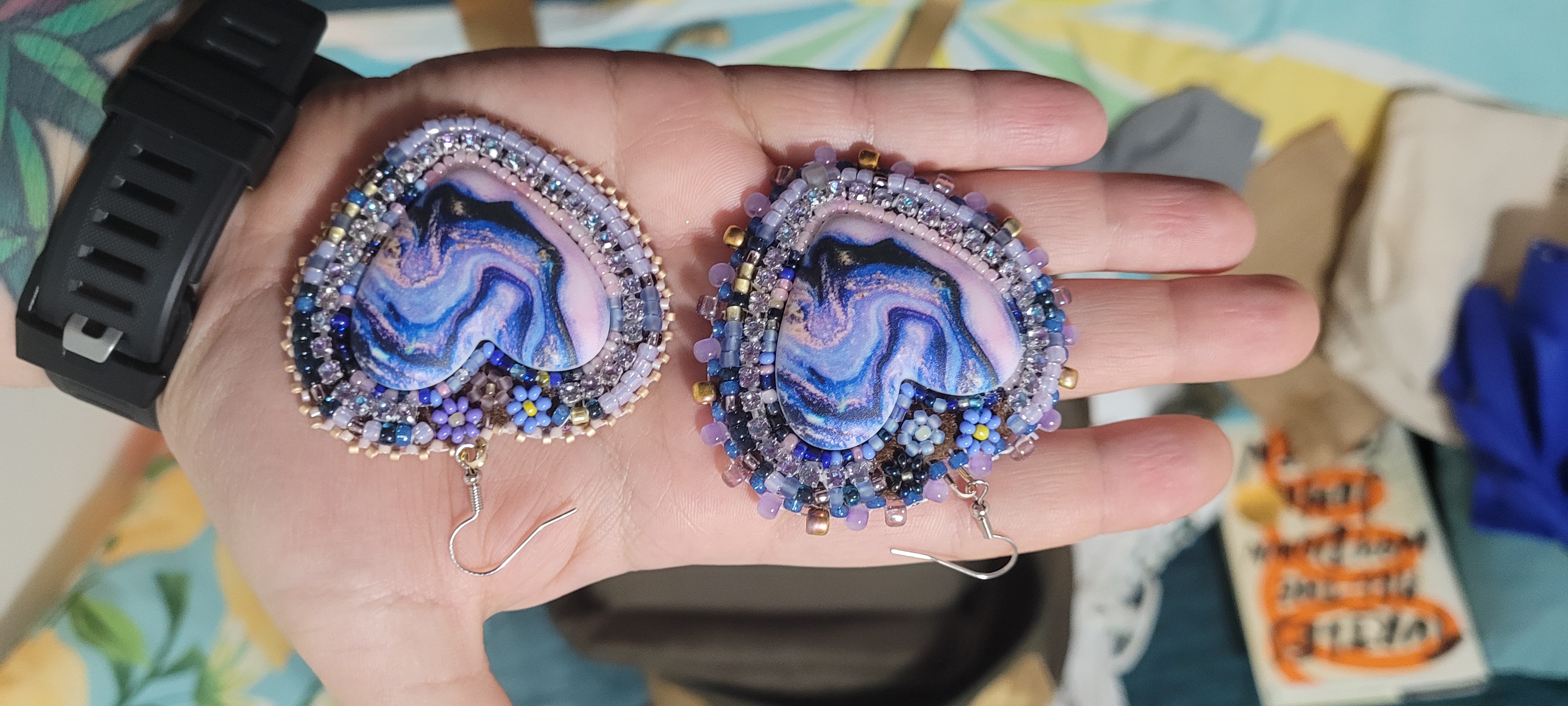 pink abd blue swirly hearts with beaded flowers around the rim