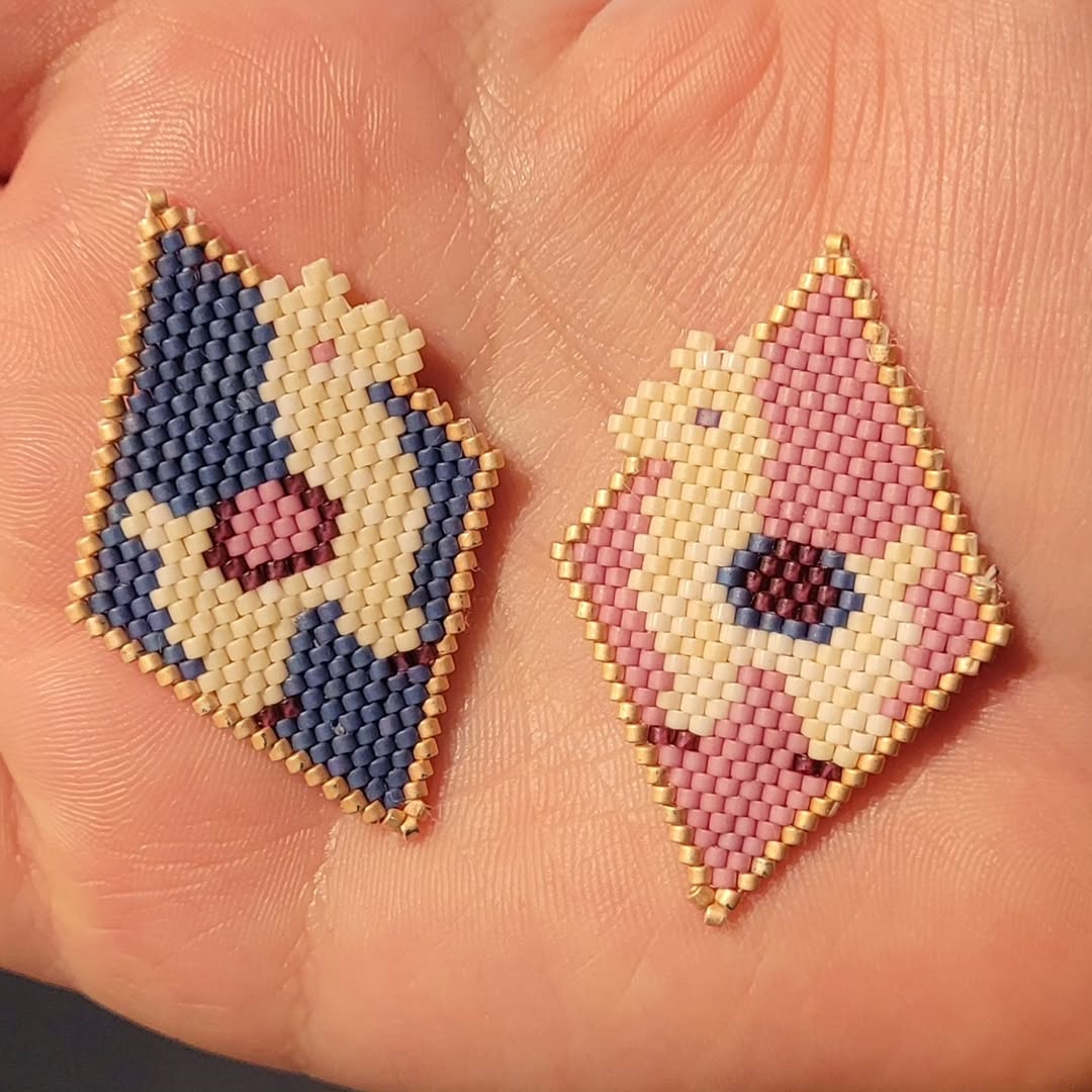 two beaded llamas (using brick stitch) inside coloured diamonds